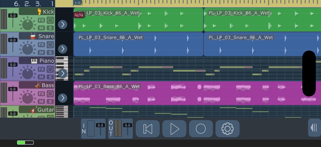 MultiTrack on iPhone, held sideways: Kick, Snare, Piano and Bass tracks with their meters and track controls beside the timeline