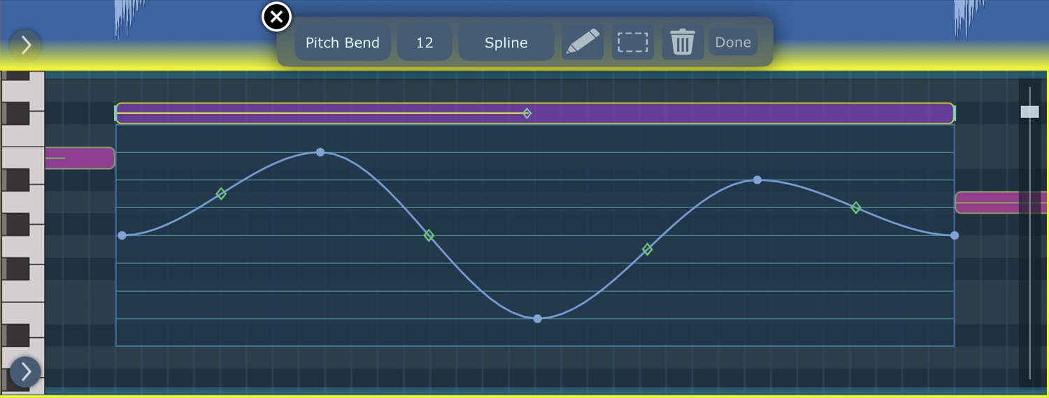 The piano roll's pitch bend lane for one note: a smooth spline curve with draggable handles, under a toolbar reading Pitch Bend and Spline